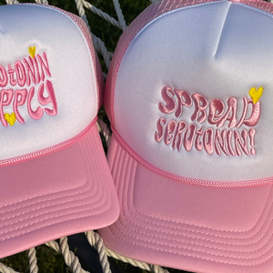 SPREAD SEROTONIN PINK TRUCKER HAT